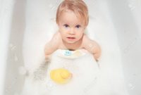 A Little 15 Year Old Ba Boy Playing In A Bubble Bath Cute in dimensions 1300 X 975