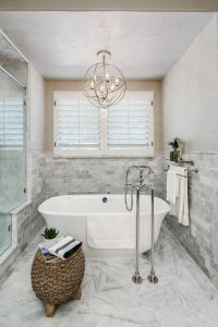 A Metal Orb Chandelier Is Centered Above The Freestanding Tub In within proportions 966 X 1449