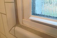 Caulk Or Grout Around Tub 3 More Cracked Grout Around The Window In for sizing 1469 X 1102