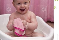 Cute Smiling Ba Girl In The Bathtub Stock Photo Image Of inside measurements 1012 X 1300