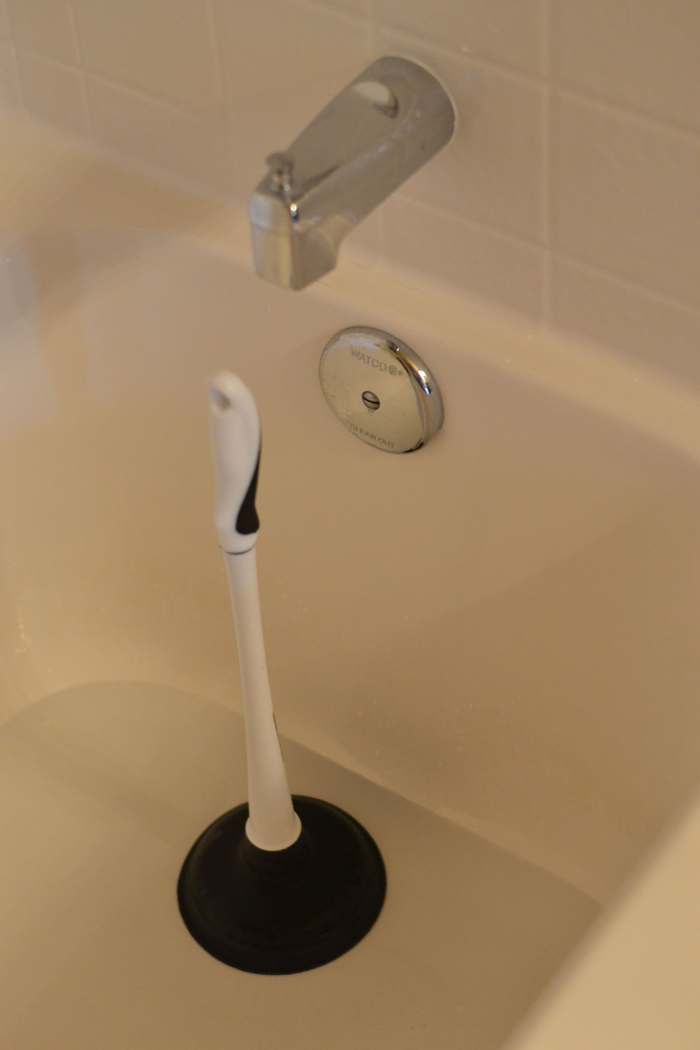Use A Plunger To Dislodge Wad Of Hair Plugging Bathtub Drain throughout measurements 2304 X 3456
